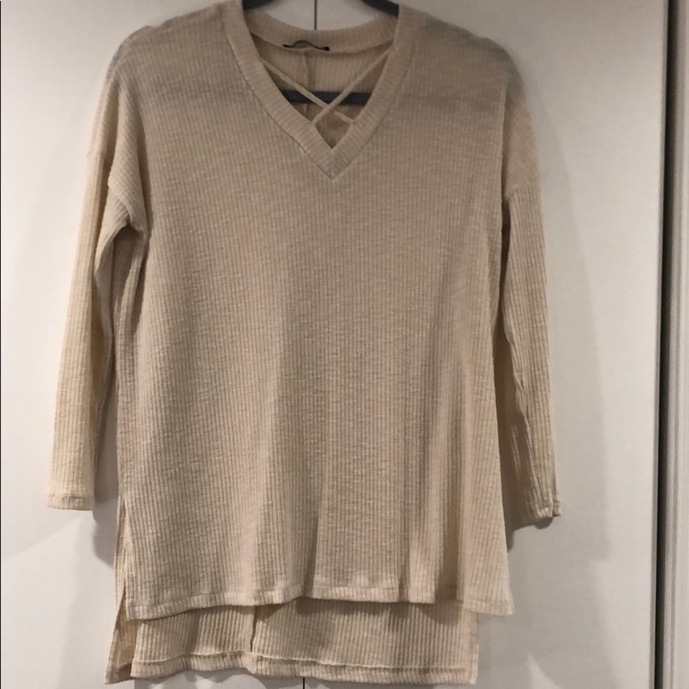 Cream tunic.